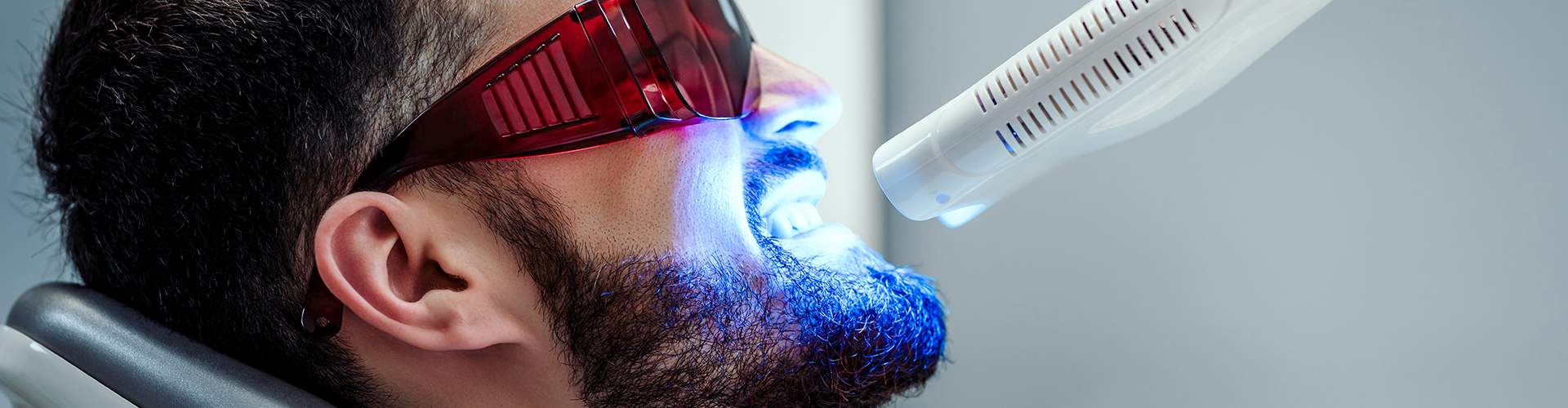 A man getting a teeth whitening.