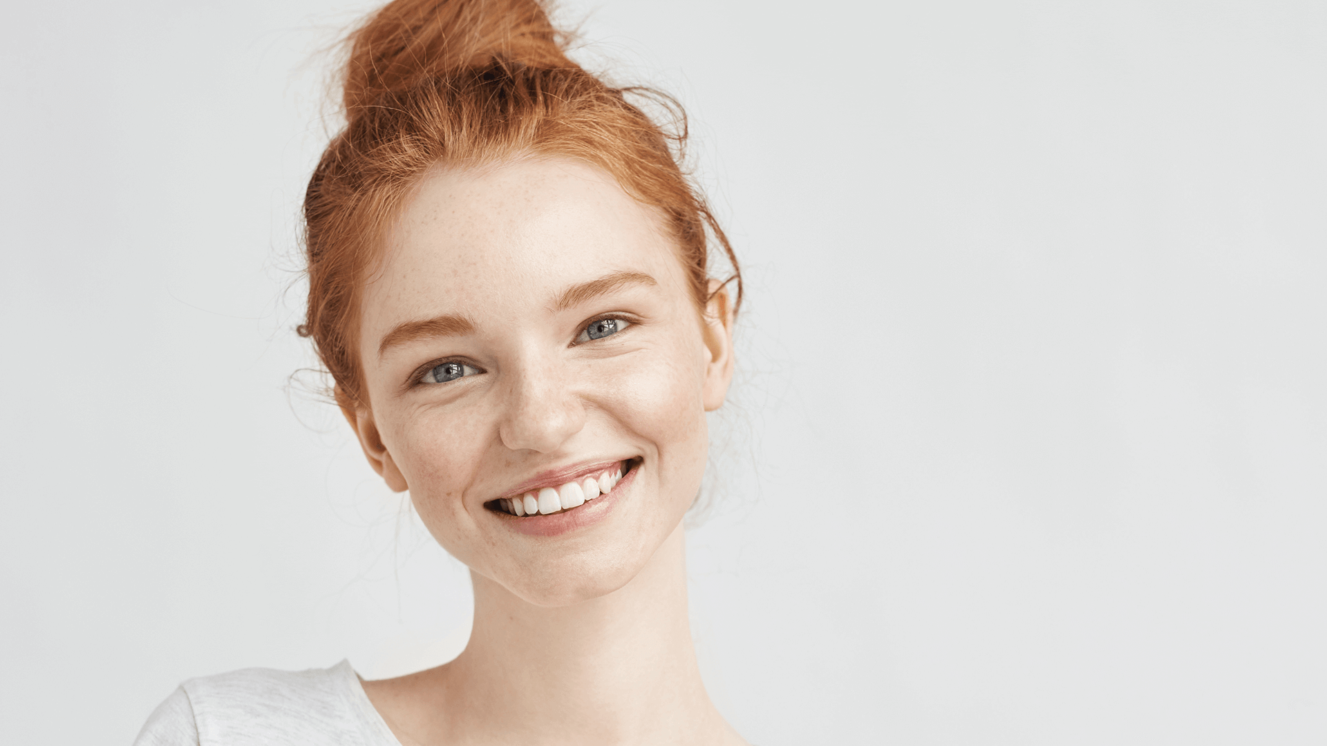image of a lady with bright teeth smiling