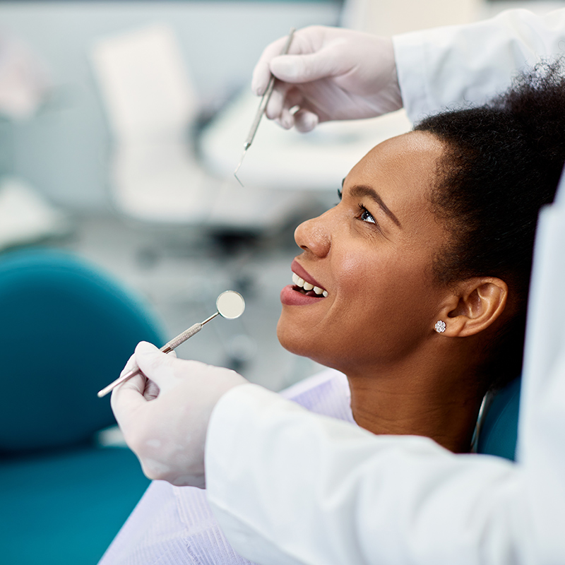 image of a lady undergoing a dental exam
